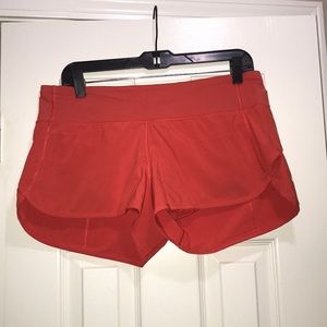 Red Lululemon shorts